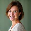 Portrait of Dr. Elara Vance, a friendly and professional woman in her 40s or 50s.